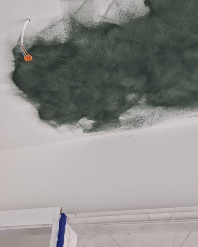 Finished Limewash wall with natural layered depth after touch-ups