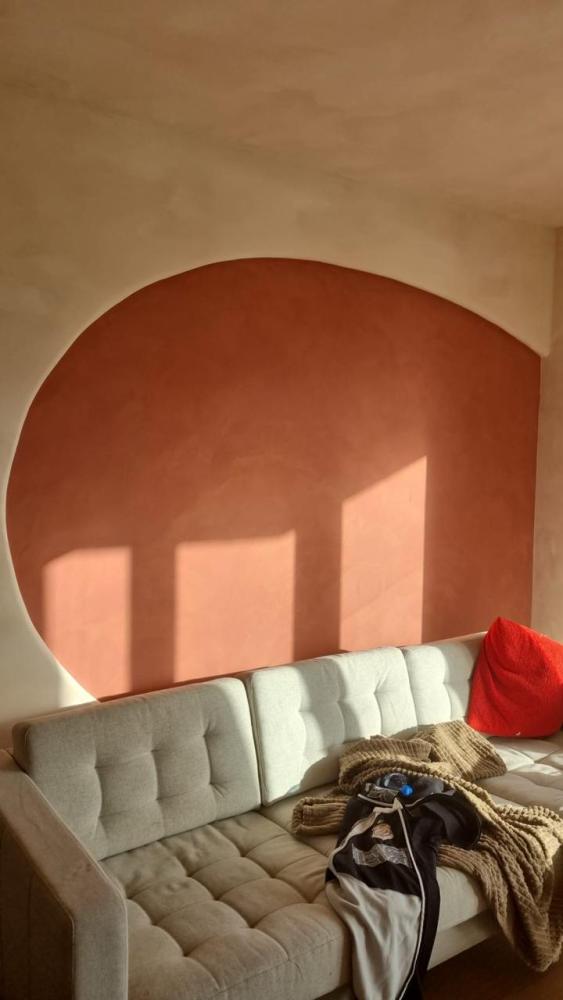 Historic building wall finished with limewash paint for authentic restoration